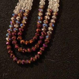 Crystal necklace Clear strands with 3 strands of brown brilliant strands Bottom
